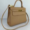 1.1 hermes kelly handbags beige in original leather 1.jpg