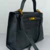 1.1 hermes kelly handbags mate black in original leather.jpg
