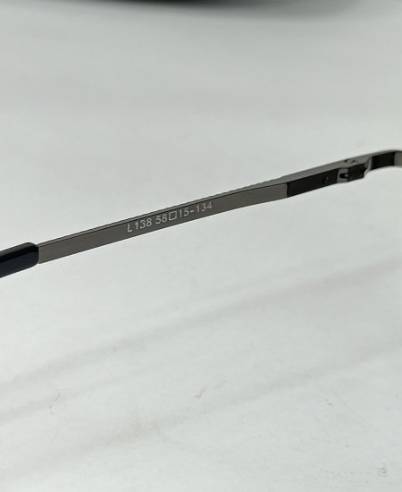 amazon leftover lacste metallic black sunglasses 5.jpg
