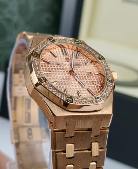 audemars piguet royal oak 15450st rose gold with diamond bezel 1.jpg