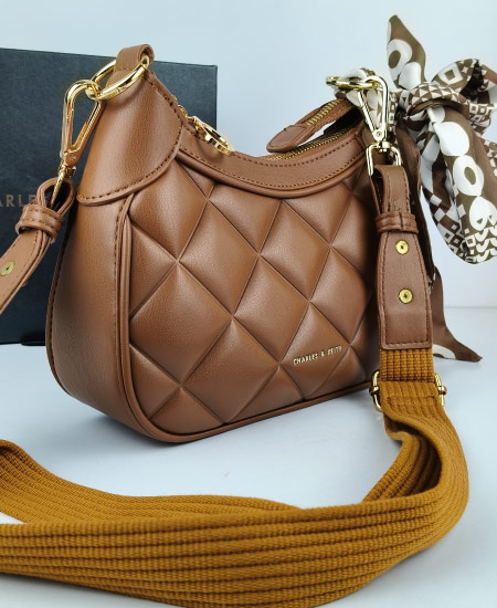 charles and keith moon face brown handbags 1.jpg