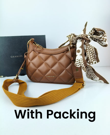 charles and keith moon face brown handbags 5.jpg