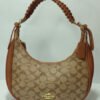 coch luxury moon face handbag 1.jpg