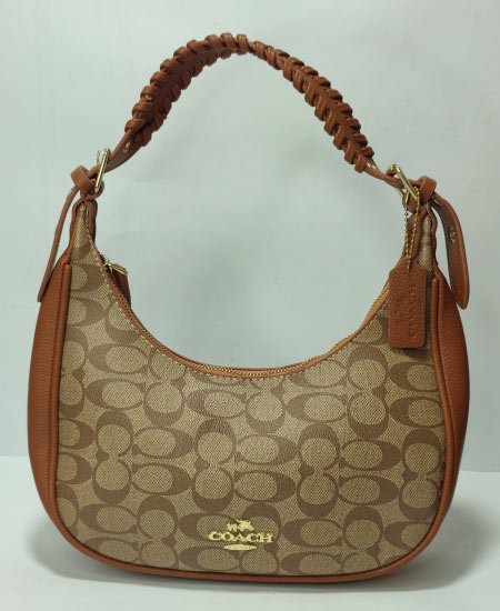 coch luxury moon face handbag 1.jpg