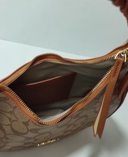 coch luxury moon face handbag 2.jpg