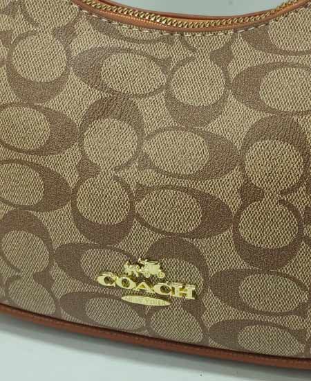 coch luxury moon face handbag 4.jpg