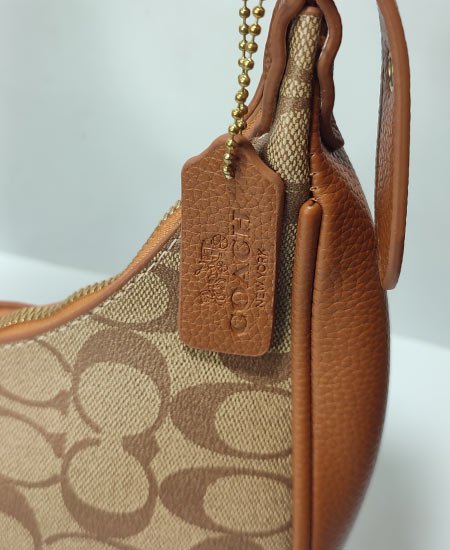 coch luxury moon face handbag 5.jpg