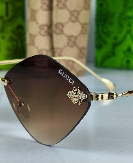 gucci sunglasses brown fly 1.jpg gucci sunglasses brown fly 1.jpg