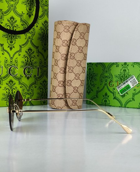 gucci sunglasses brown fly 2.jpg gucci sunglasses brown fly 2.jpg