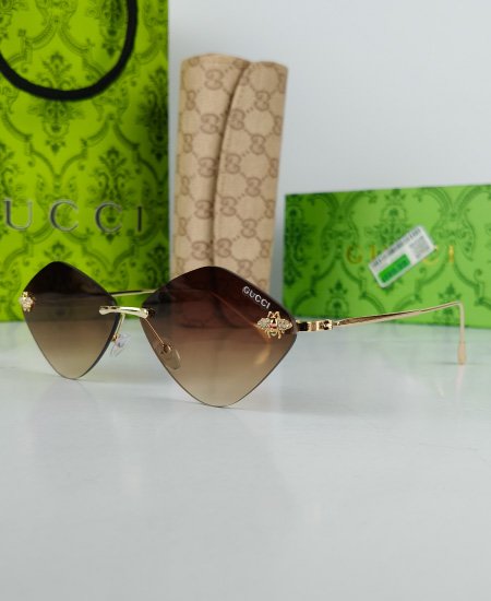gucci sunglasses brown fly 4.jpg gucci sunglasses brown fly 4.jpg