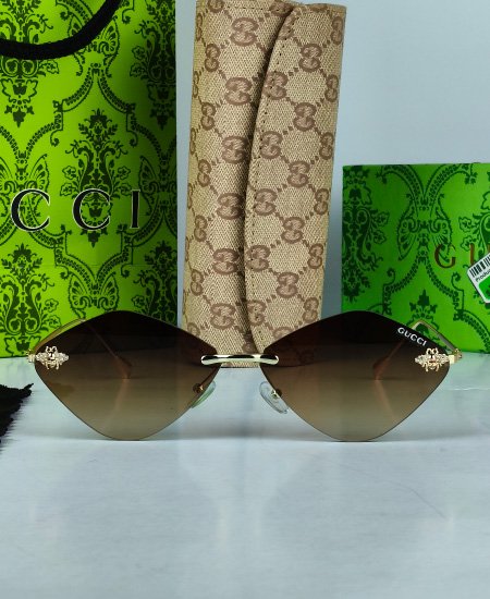 gucci sunglasses brown fly 5.jpg gucci sunglasses brown fly 5.jpg