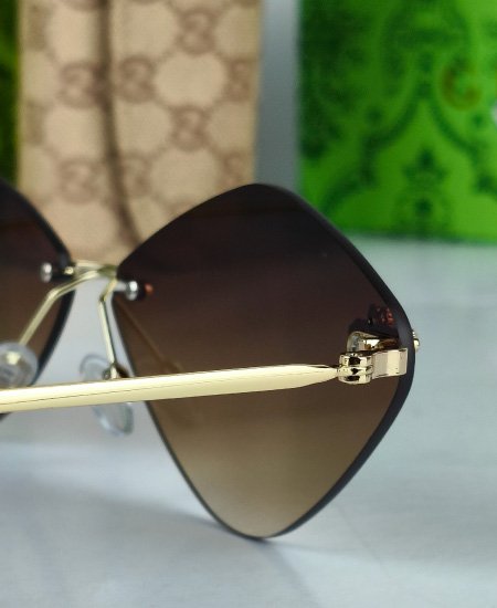 gucci sunglasses brown fly.jpg gucci sunglasses brown fly.jpg