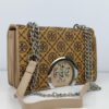 tory burch skin handbag 1.jpg